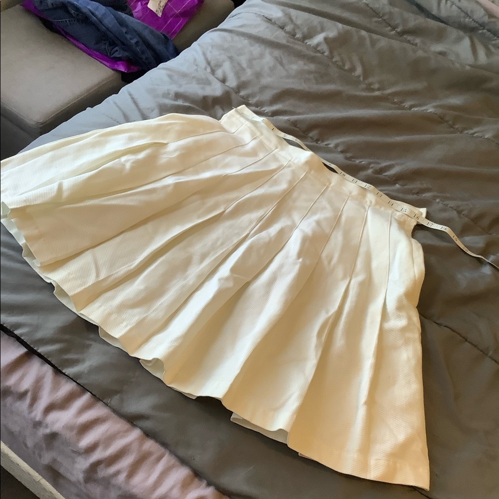 White pleated skirt
